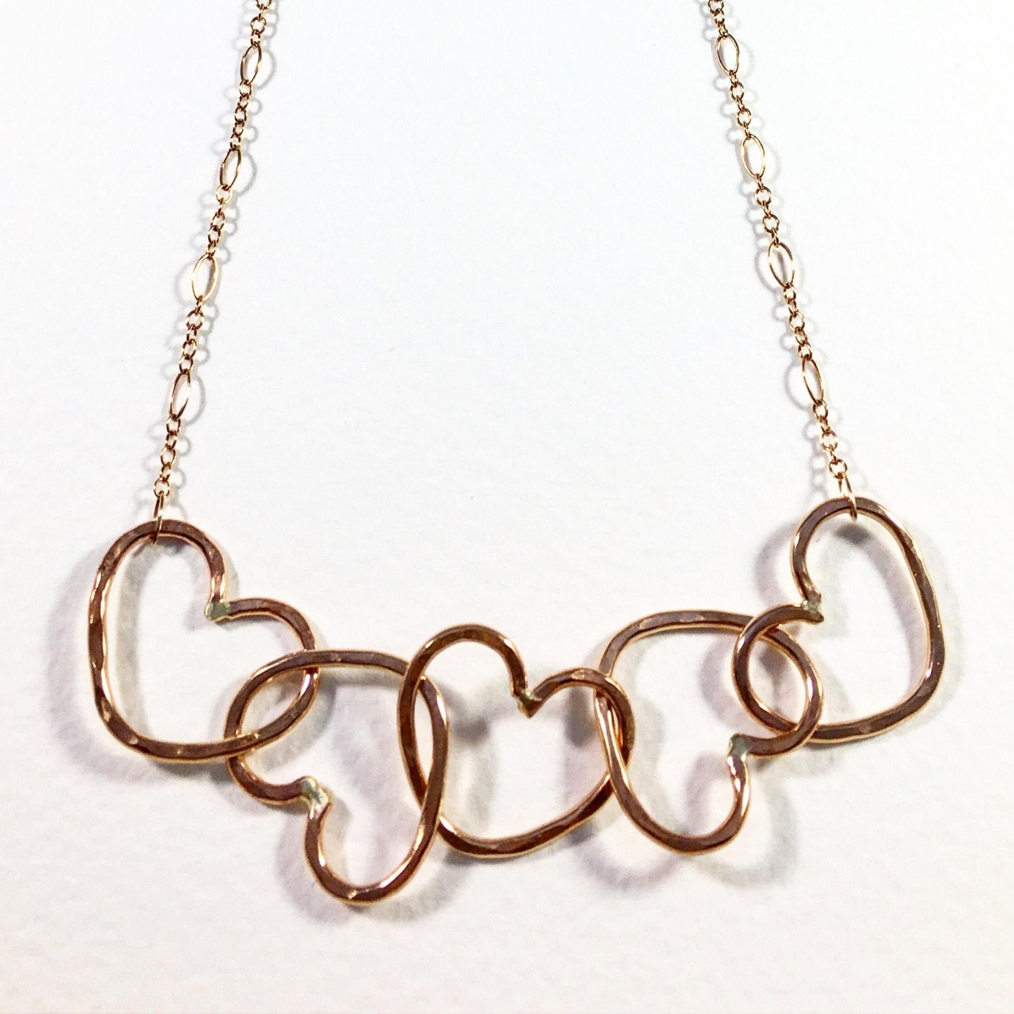 Five Hearts Linked Necklace - KME means the very best