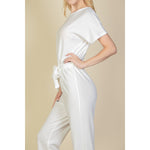 Load image into Gallery viewer, Loungewear Luxe: Capella&#39;s Relaxed Jumpsuit with Tie Waist - KME means the very best
